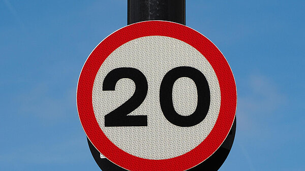 Twenty miles per hour speed sign.